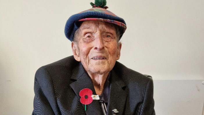 New Zealand's oldest man, 107-year-old Jack Coe, enjoys the Anzac ceremony at St Johns Wood Care Centre and Village in Taupō.