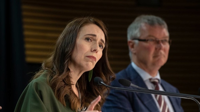 Prime Minister Jacinda Ardern and Revenue Minister David Parker. Photo / Mark Mitchell