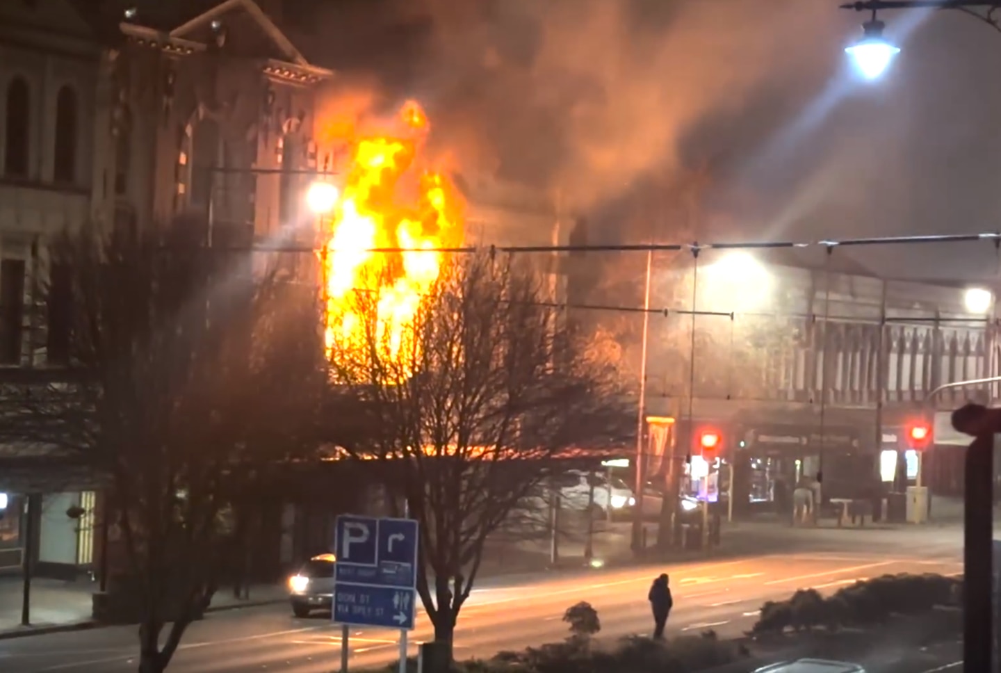 Eight fire crews and a ground unit were called to the Pall Mall Arcade building on Dee St just before 1am. Photo / Richard Stone