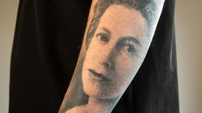 Tauranga man Declan Jones has a tattoo of the Queen on his arm. Photo / Mead Norton'