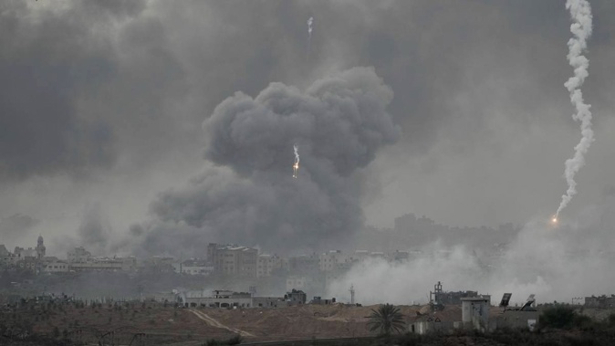 Smoke rises following an Israeli airstrike in the Gaza Strip, as seen from southern Israel. Photo / AP