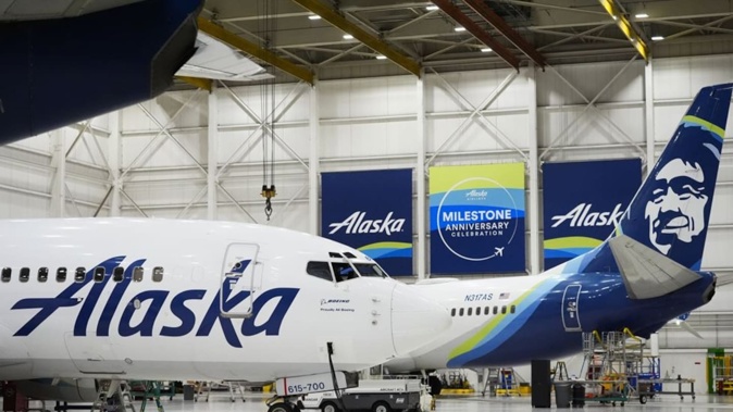 An Alaska Airlines aircraft sits in the airline's hangar at Seattle-Tacoma International Airport. Photo / AP