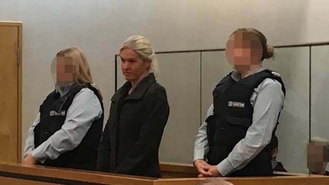 Tessa Grant in the dock of the Hamilton District Court in 2017, after admitting stealing more than $2.7 million. She was in court again today. Photo / NZME