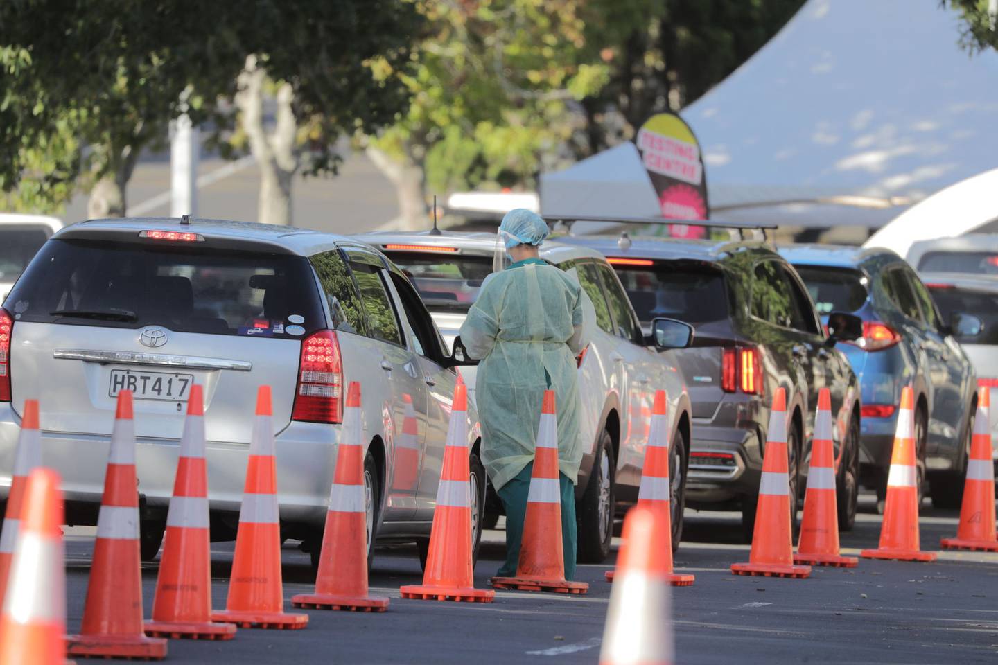 A long queue at the Northcote Covid testing station in College Rd this morning. (Photo / Michael Craig)