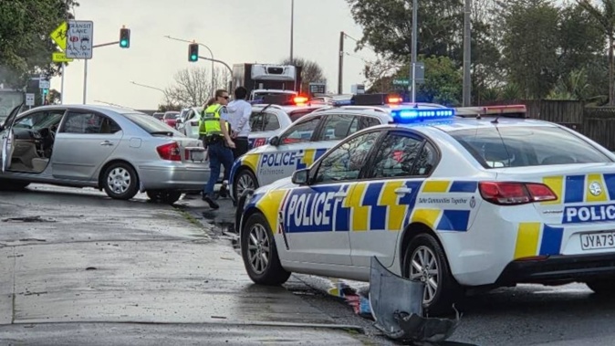 Two teenagers have been arrested after attempting to flee police in Auckland. The incident ended when an allegedly stolen Toyota Premio hit another vehicle on Onewa Rd in Birkenhead. Photo / Trevor Coppock