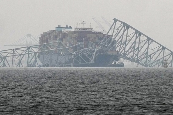 A container ship rests against the wreckage of the Francis Scott Key Bridge on Thursday, March 28. 2024, in Baltimore, Md. Photo / AP 