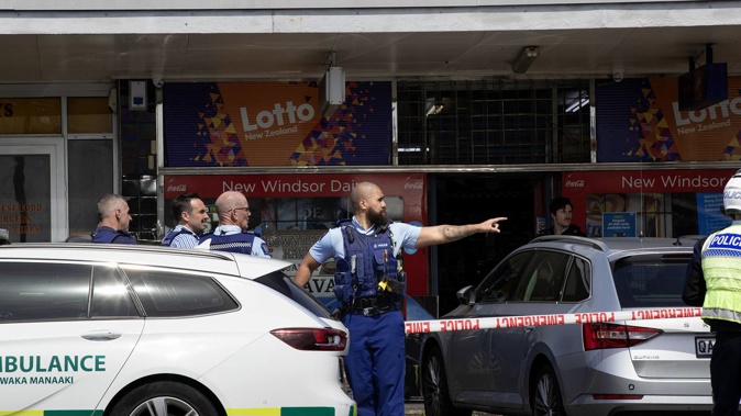 The owner of a shop adjacent to the New Windsor Dairy and Lotto shop told media one of the victims was stabbed in the neck and cheek. Photo / Hayden Woodward