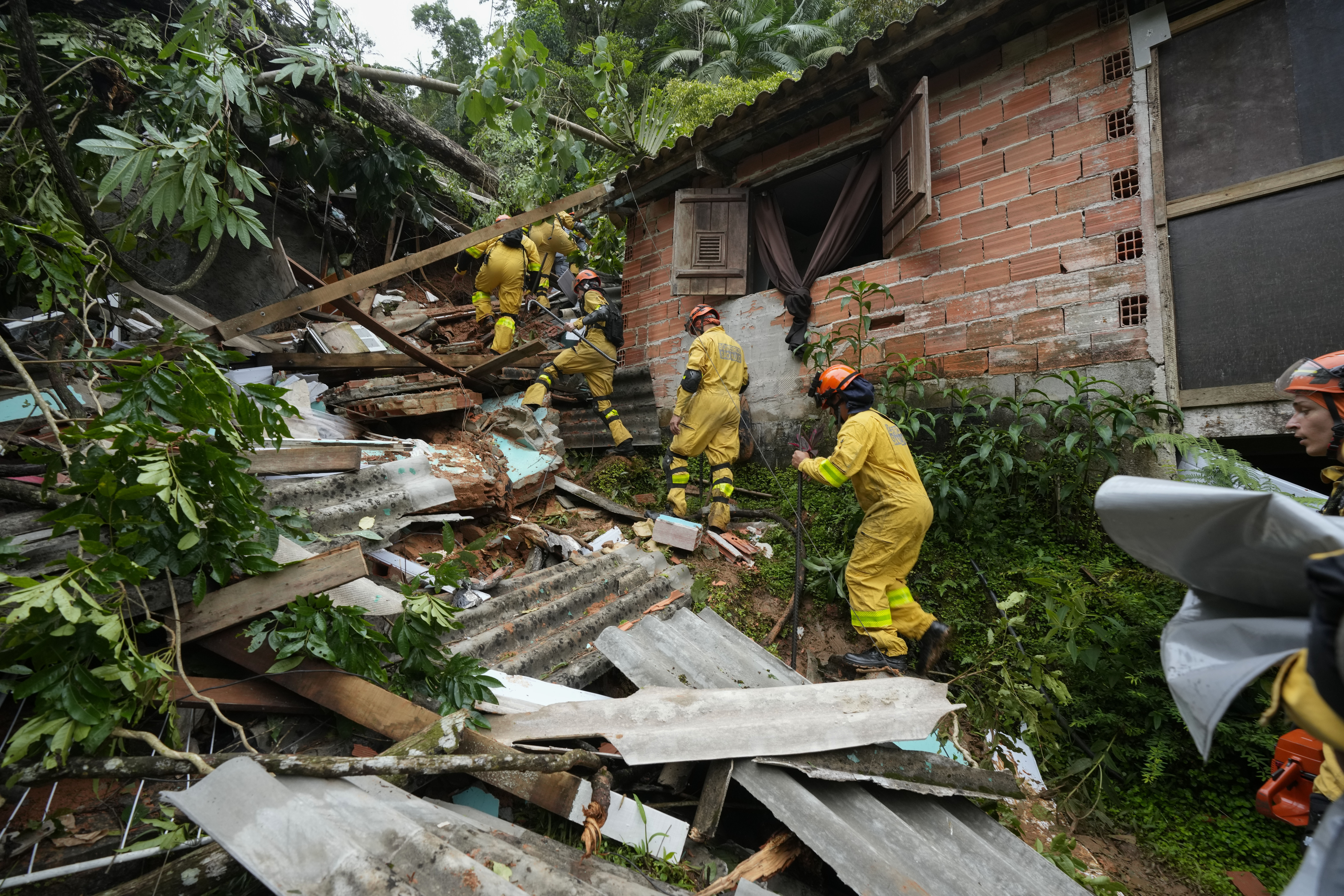 Rescue workers search for survivors after flooding triggered deadly landslides near Juquehy beach in Sao Sebastiao, Brazil, Monday, Feb. 20, 2023. Photo / AP