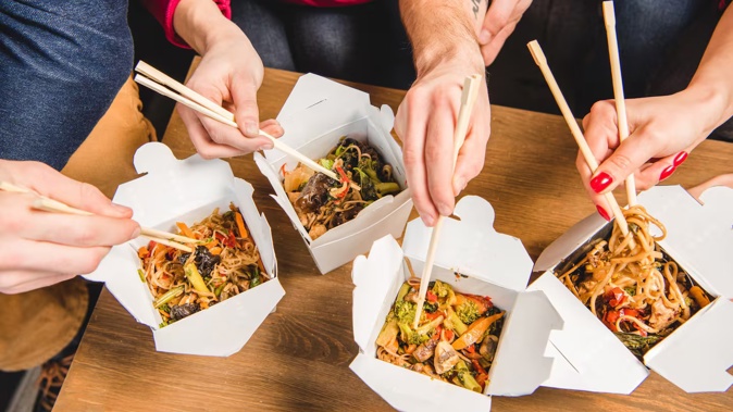 Kiwis are turning to takeaways for convenience and affordability instead of dining out. Photo / 123RF