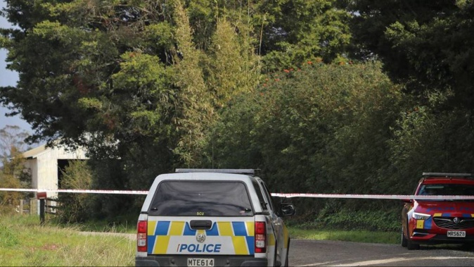 Police at the scene of a homicide in Northland yesterday. Photo / Peter de Graaf