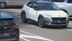The CCTV footage of Mount Maunganui resident Sue Carreyett's vehicle partially stopped in the Marine Parade cycle lane waiting to get a park. She was fined $100 for doing so.