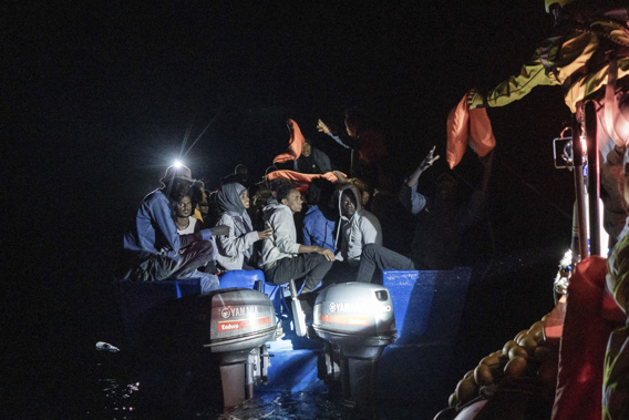 Rescuers approach a migrants' boat adrift in international waters off Malta in the Mediterranean Sea, on Oct. 25, 2022. Photo / AP