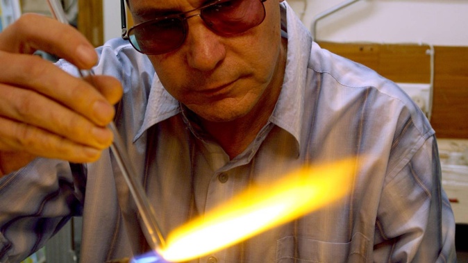 Waikato University glassblower Steven Newcombe, pictured in 2007, is one of only 13 professional glassblowers in New Zealand. Photo / NZME