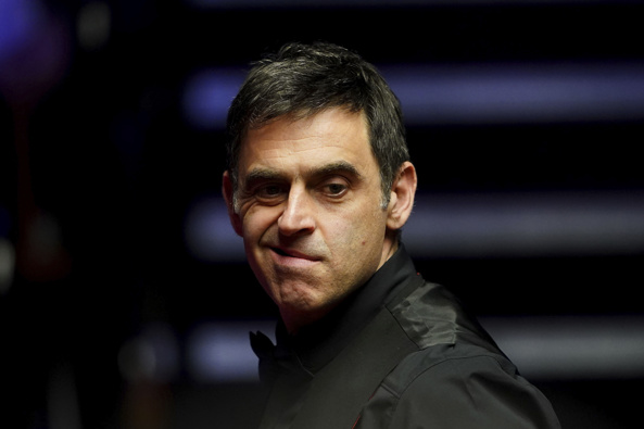 England's Ronnie O'Sullivan in action against England's Judd Trump during day seventeen of the Betfred World Snooker Championship. (Photo / AP)