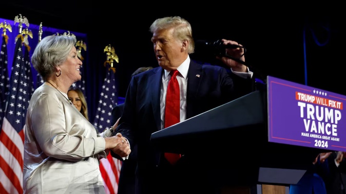 Donald Trump praises his campaign senior advisor Susie Wiles during an election night event. The US dollar has been invigorated by expectations Trump’s trade policies could keep interest rates higher. Photo / Chip Somodevilla, Getty Images
