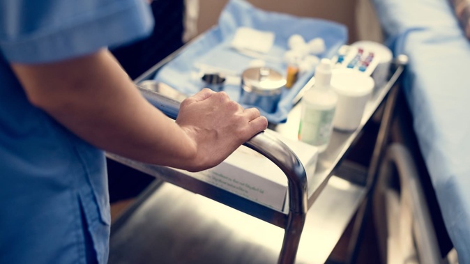 A union is mulling whether stab-proof vests and personal alarms should be rolled out for nurses after one was stabbed while on the job. Photo / 123rf
