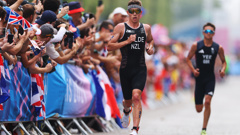 Hayden Wilde of Team New Zealand competes during Men's Individual Triathlon on day five of the Olympic Games Paris 2024 at Pont Alexandre III on July 31, 2024 in Paris, France. (Photo by Lars Baron/Getty Images)
