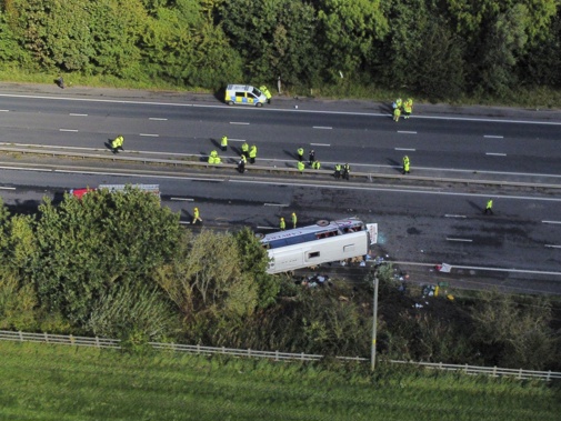 Emergency services at the scene of a coach crash on the M53 motorway, between junction 5 at Ellesmere Port and junction 4 at Bebbington in Hooton, England, Friday Sept. 29, 2023. Photo / AP
