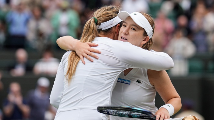 Donna Vekic (L) of Croatia greets Lulu Sun of New Zealand after their Women's Singles quarter finals match during day nine of The Championships Wimbledon 2024 at All England Lawn Tennis and Croquet Club on July 09, 2024 in London, England. (Photo by Shi Tang/Getty Images)