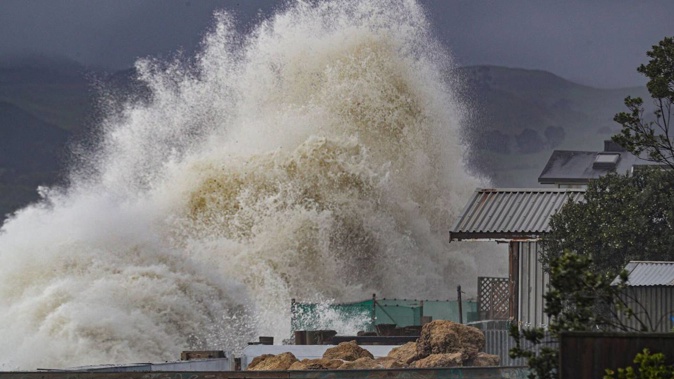 Big swell hits the back yards of Te Awanga beach houses, Napier. Photo / Warren Buckland
