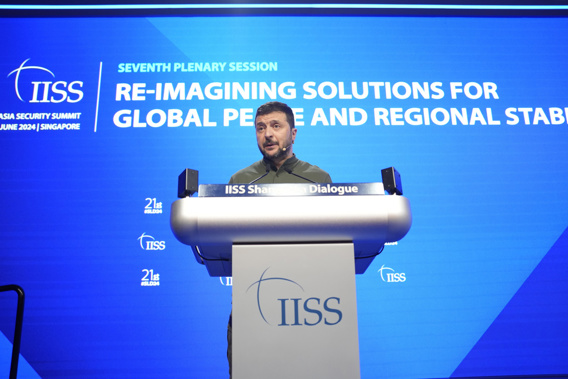 Ukraine's President Volodymyr Zelenskyy speaks during the 21st Shangri-La Dialogue summit at the Shangri-La Hotel in Singapore, Sunday, June 2, 2024. (AP Photo/Vincent Thian)