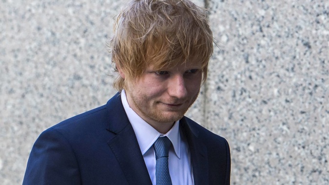 The trial will continue tomorrow where the singer will once again take the stand. Photo / AP