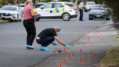 Police on Sunderland Dr, Flaxmere, the scene where one person says they saw a body being loaded into a car. Photo / Paul Taylor