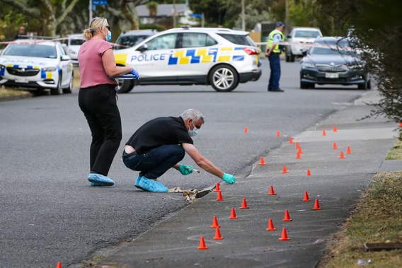 Police on Sunderland Dr, Flaxmere, the scene where one person says they saw a body being loaded into a car. Photo / Paul Taylor