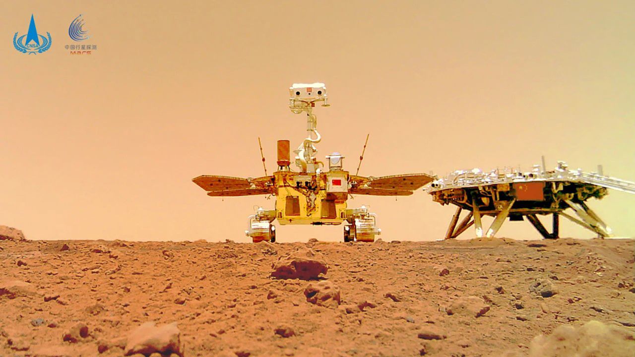 This image showing the rover and the lander on the surface of Mars was taken by a separable camera deployed by the Zhurong rover in 2021. CNSA