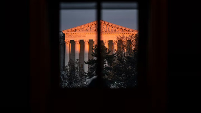The sun sets on the Supreme Court in Washington. Photo / Jabin Botsford, The Washington Post