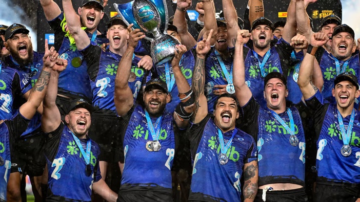 Blues captain Patrick Tuipulotu lifts the Super Rugby Pacific trophy after last year's final. Photo / Photosport