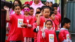Pupils at Flaxmere Primary School walked around the block showing off their new shirts for Pink Shirt Day. Photo / Paul Taylor