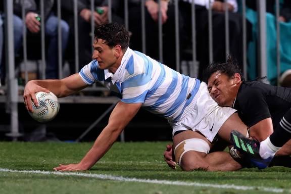 Samso Gonzalez of Argentina scores a try. Photo / AP