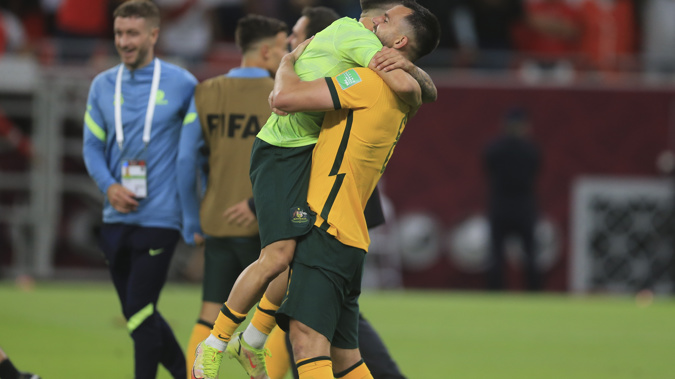 Australian players celebrate after winning in a penalty shoot-out during the World Cup 2022 qualifying play-off football match between Australia and Peru in Al Rayyan, Qatar,. Photo / AP