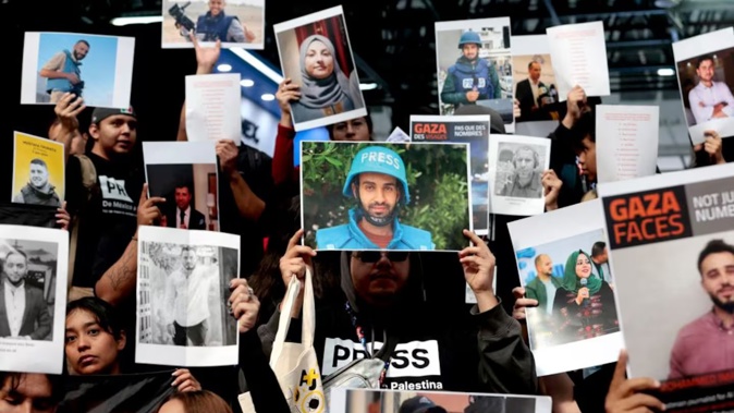 Mexican journalists and journalism students take part in a demonstration of solidarity and protest for colleagues detained, disappeared and killed in Gaza during the 38th edition of the International Book Fair in Guadalajara, Mexico. Photo / AFP