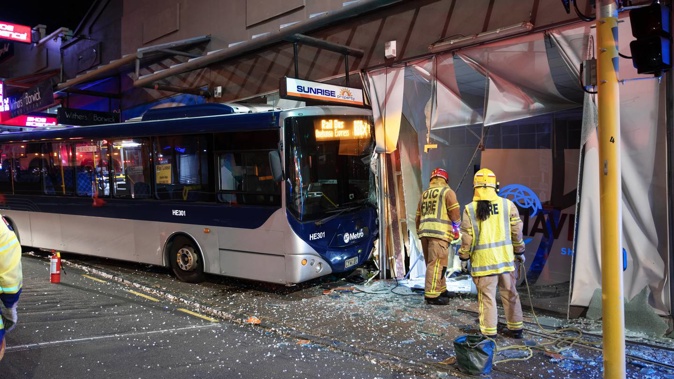 A bus which crashed into shops on Remuera Rd had been parked and was unoccupied, police said.