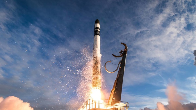 One of Rocket Lab's electron rockets lifts off from Mahia Peninsula. Photo / Trevor Mahlmann