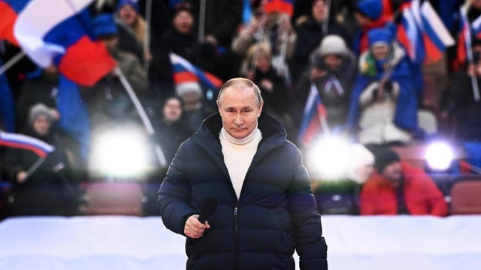 Russian President Vladimir Putin delivers a speech at a concert marking the eighth anniversary of the referendum on the state status of Crimea and Sevastopol earlier this month. (Photo / AP)