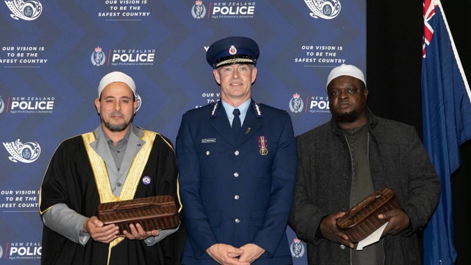 Imam Gamal Fouda of Masjid Al-Noor, Commissioner of Police Andrew Coster, and Imam Adbul Alabi Lateef of Linwood Islamic Centre at today's awards ceremony. Photo / Supplied