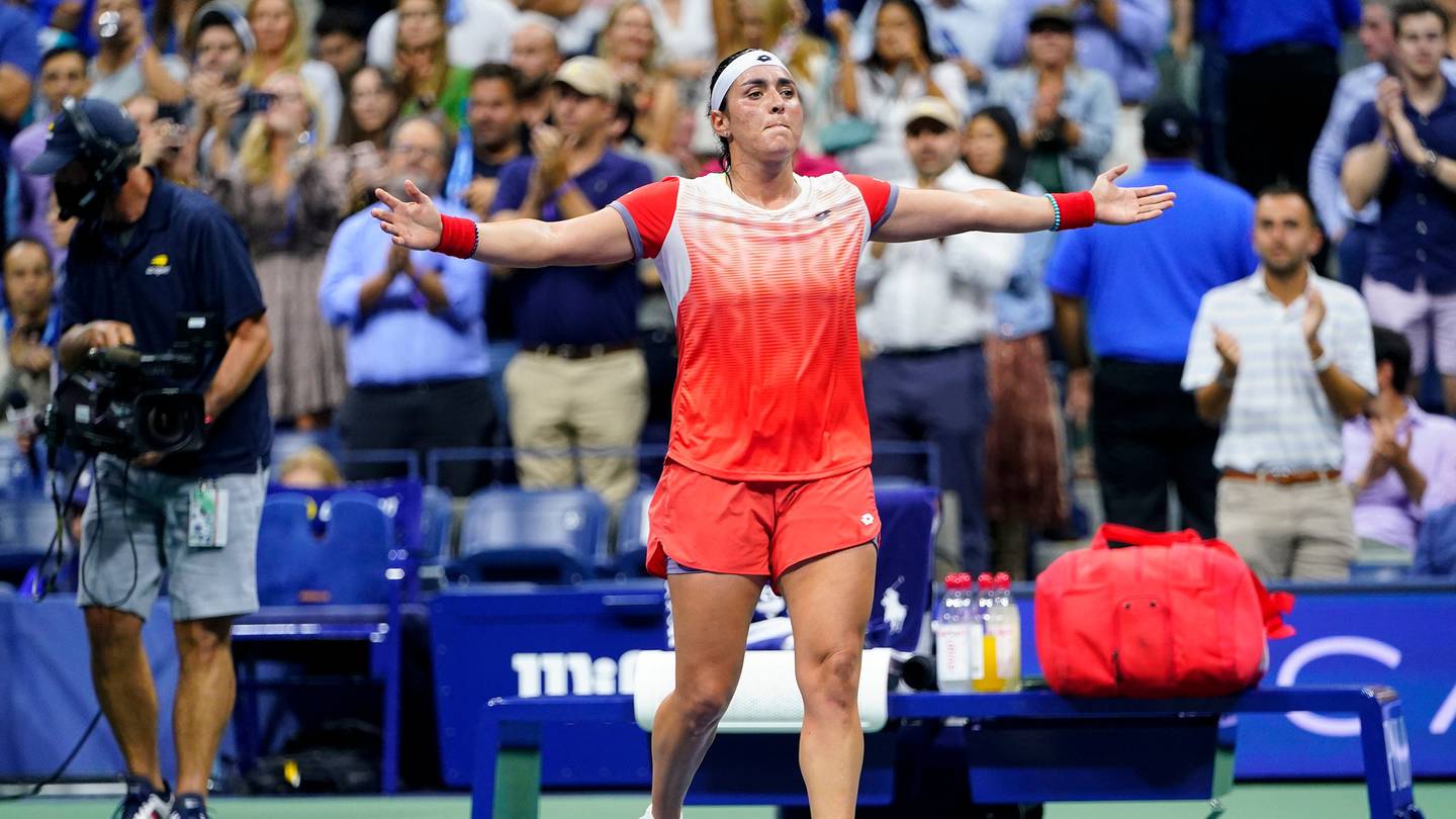 Ons Jabeur celebrates after beating Caroline Garcia. Photo / AP
