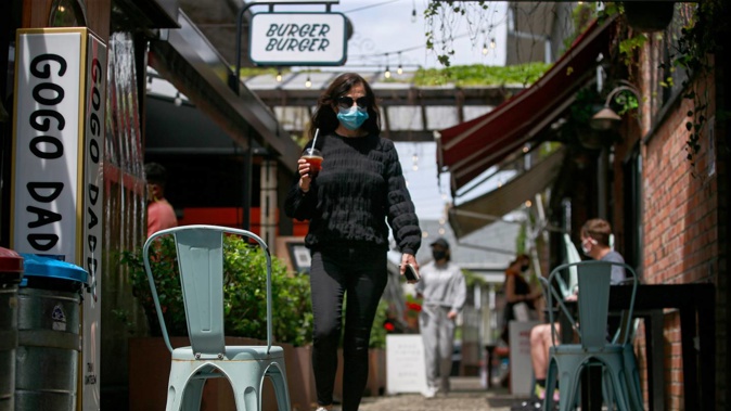 Hospitality venues like bars and restaurants can stay open under the red traffic light settings, provided measures like capacity limits and vaccine pass requirements are in place. Photo / Alex Burton