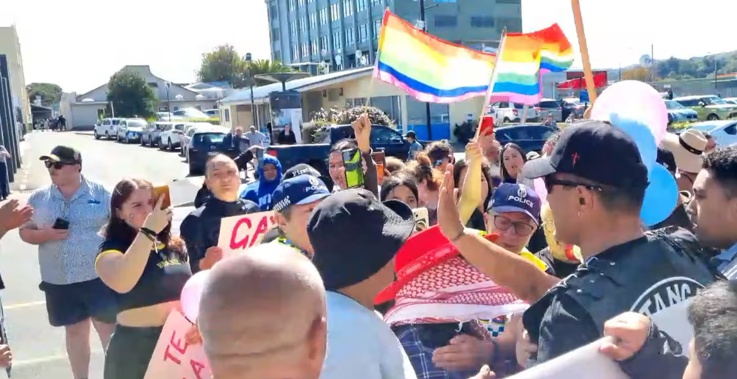 Tensions are high outside the Gisbrone Library where protesters are clashing.