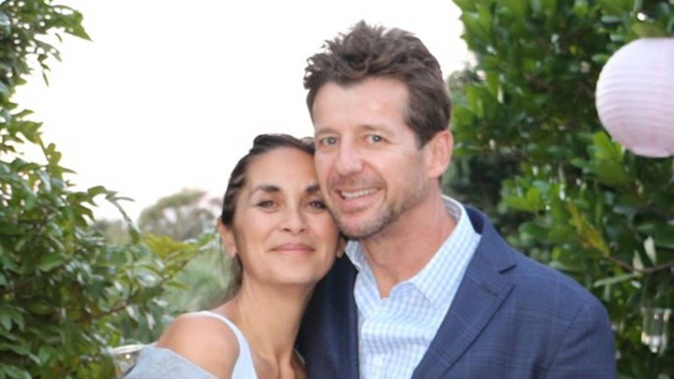 Simon Barnett with his wife Jodi at their daughter Sophie's wedding in 2018.