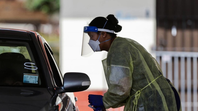 A person gets tested for Covid-19 at Papakura Marae's drive-through testing station. Photo / Alex Burton
