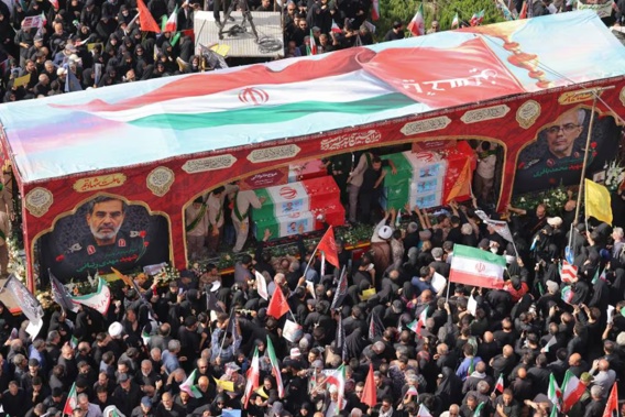 Mourners attend the funeral procession of Iranian military commanders and scientists killed during Israeli strikes at Enghelab (Revolution) Square in the capital, Tehran. Photo / AFP