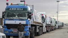 Trucks carrying humanitarian aid line up at the Rafah border crossing, Egypt, on the way to Gaza, Sunday Nov 19, 2023. Photo / AP
