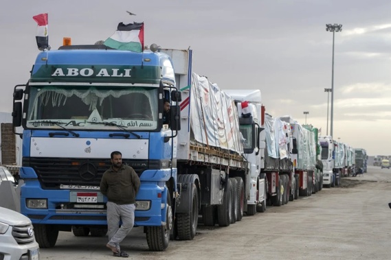 Trucks carrying humanitarian aid line up at the Rafah border crossing, Egypt, on the way to Gaza, Sunday Nov 19, 2023. Photo / AP