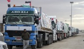 Trucks carrying humanitarian aid line up at the Rafah border crossing, Egypt, on the way to Gaza, Sunday Nov 19, 2023. Photo / AP