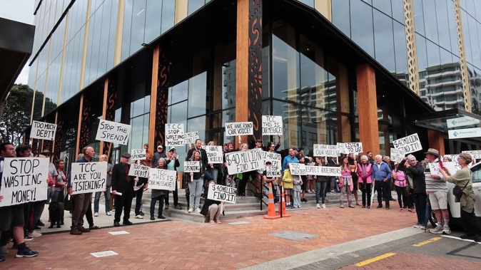 The rates rally held in Tauranga stopped outside the new council offices on Devonport Rd. Photo / Supplied