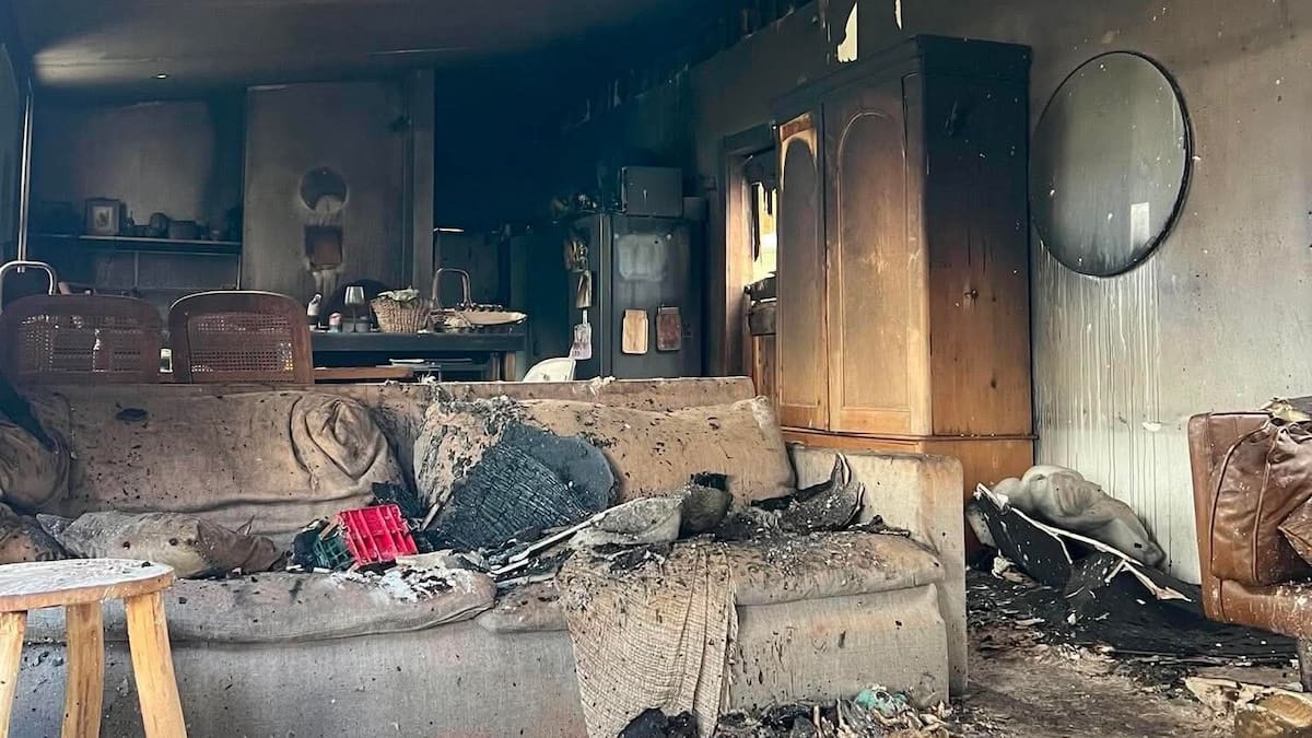 'Looks like a nuclear bomb went off': Families lose joint barn home in fire